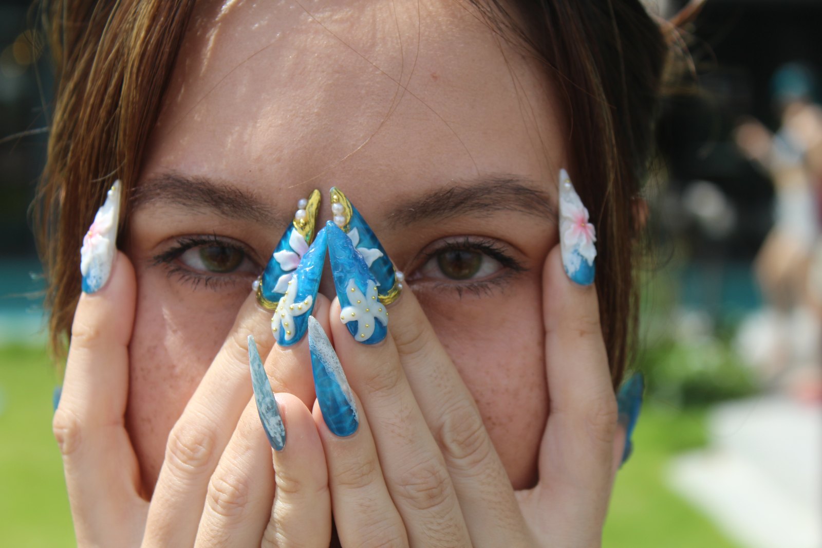 Nerina cobalt florals and wave relief on muse in daylight